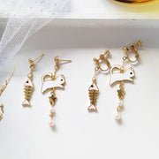 Fashion cat fish bone asymmetry earrings Gold stars Black cat earrings female popular cat eat the fish stud earrings for women